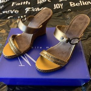 Gold wedge slip on sandals size 7.5.